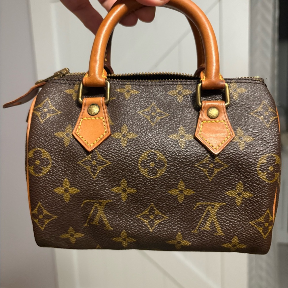 Hard to find Louis Vuitton Mini in Monogram can fit iPhone plus!